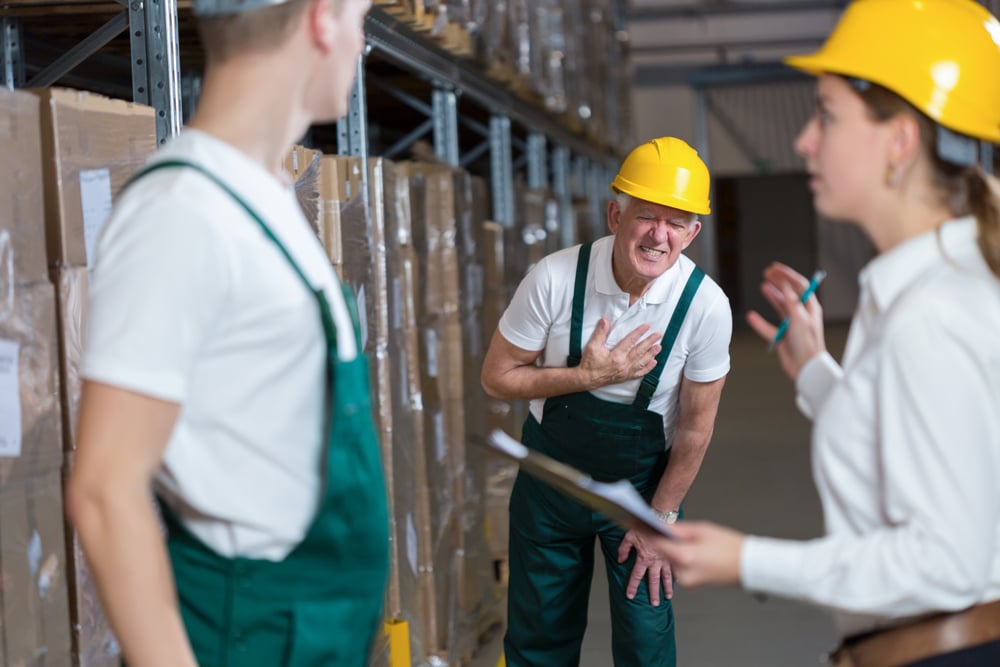 Older warehouseman having a painful infarction